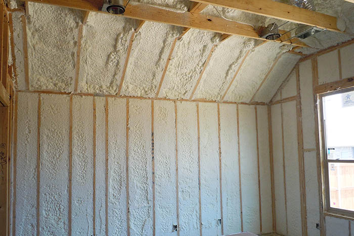 Choosing soy-based spray foam insulation is one way to minimize synthetic chemicals in your indoor environment. Credit: Demilec